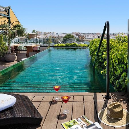 Hotel Lobby Севиля Екстериор снимка Rooftop pool