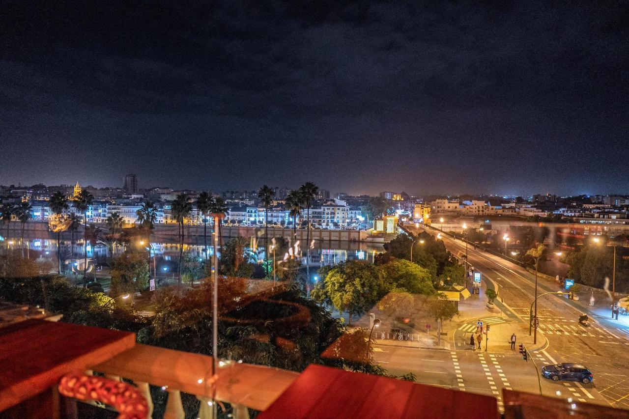 Hotel Lobby Севиля Екстериор снимка Rabat at night
