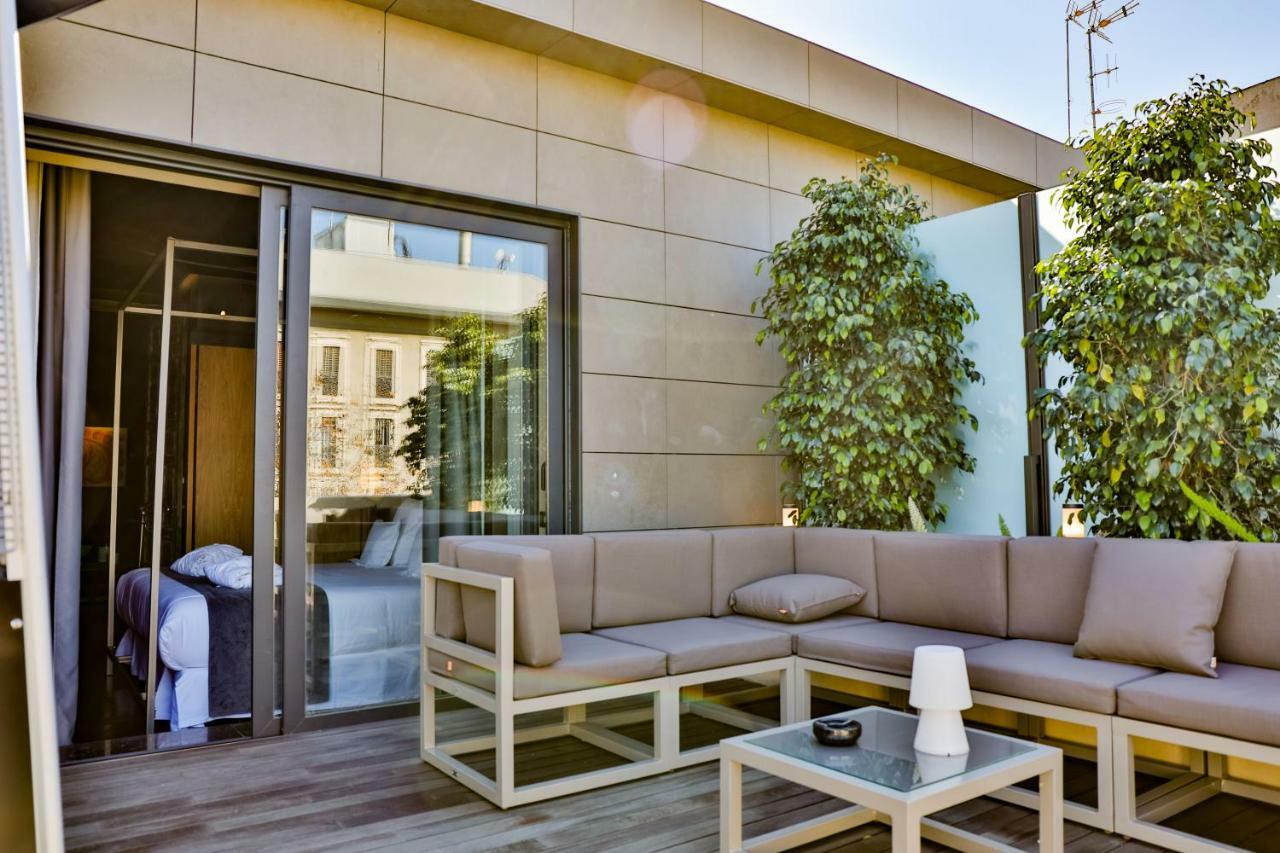 Hotel Lobby Севиля Екстериор снимка The hotel's rooftop
