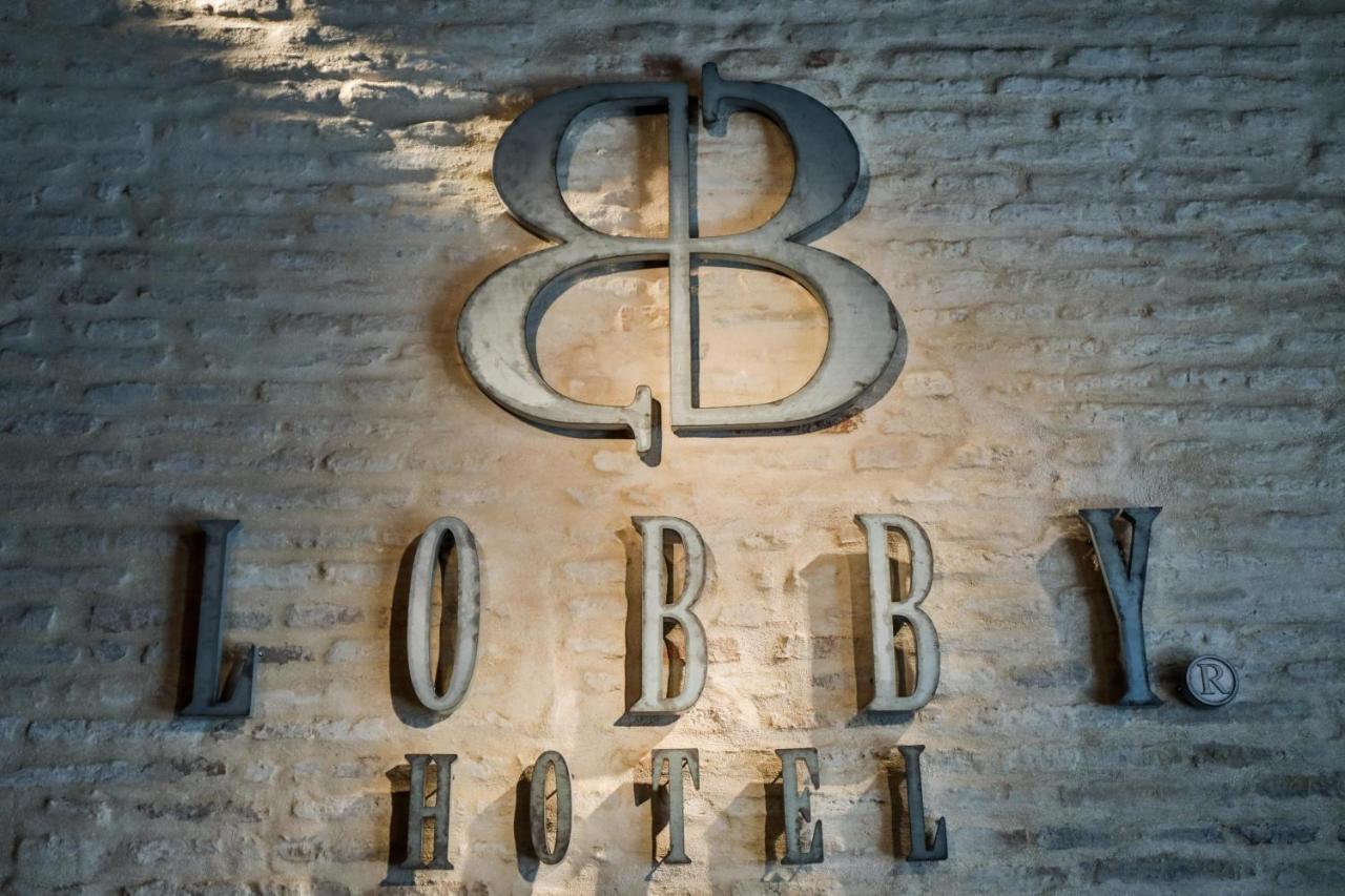 Hotel Lobby Севиля Екстериор снимка The logo of the 88th Fighter Group